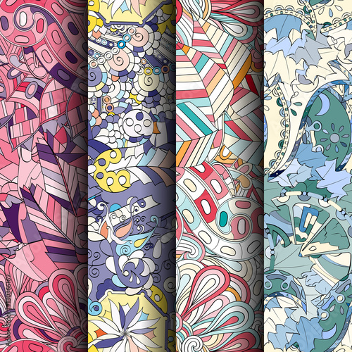 Set of tracery colorful seamless patterns. Curved doodling backgrounds for textile of printing with mehndi and ethnic motives. Vector.