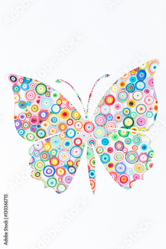Concept of butterfly on colorful paper made with quilling techni