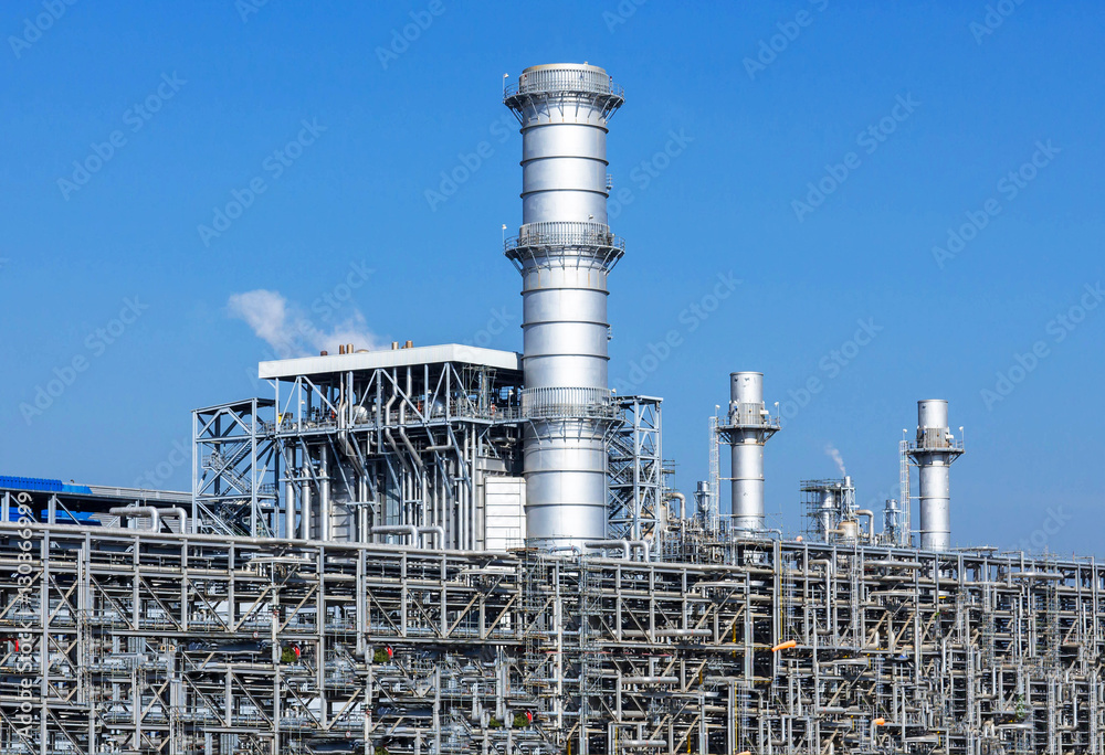 Petrochemical plant, oil refinery factory with cloudy sky