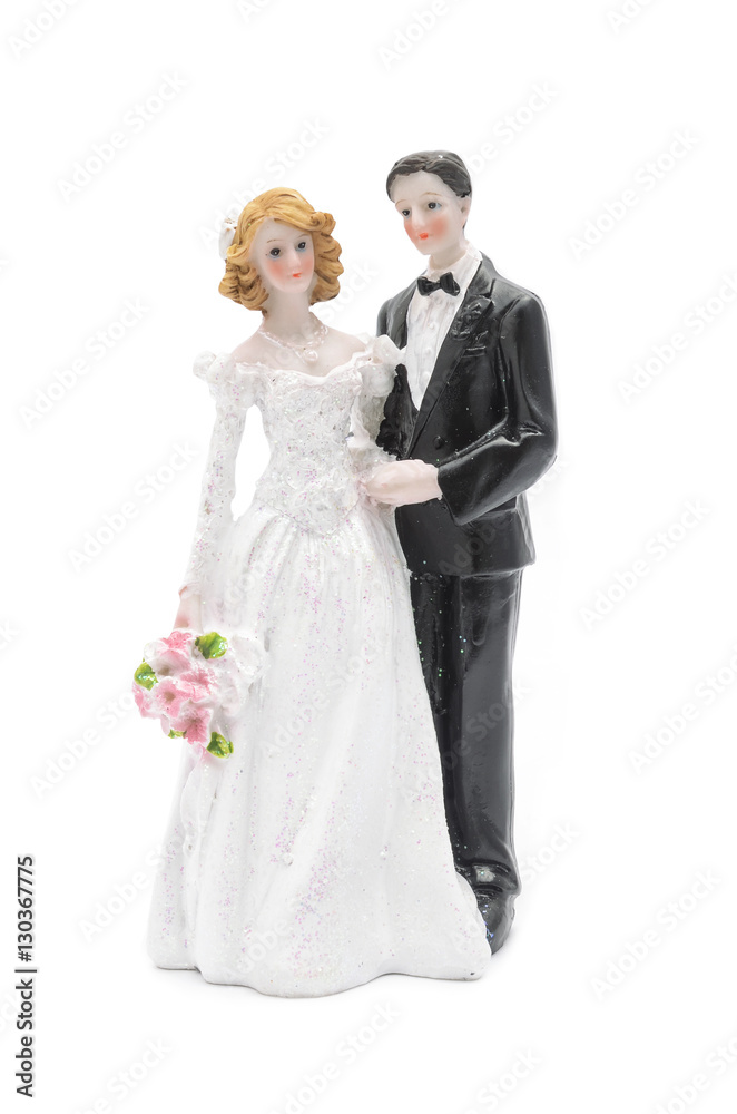 figurine the bride and groom isolated on white