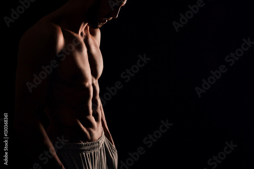 Young man with muscular torso
