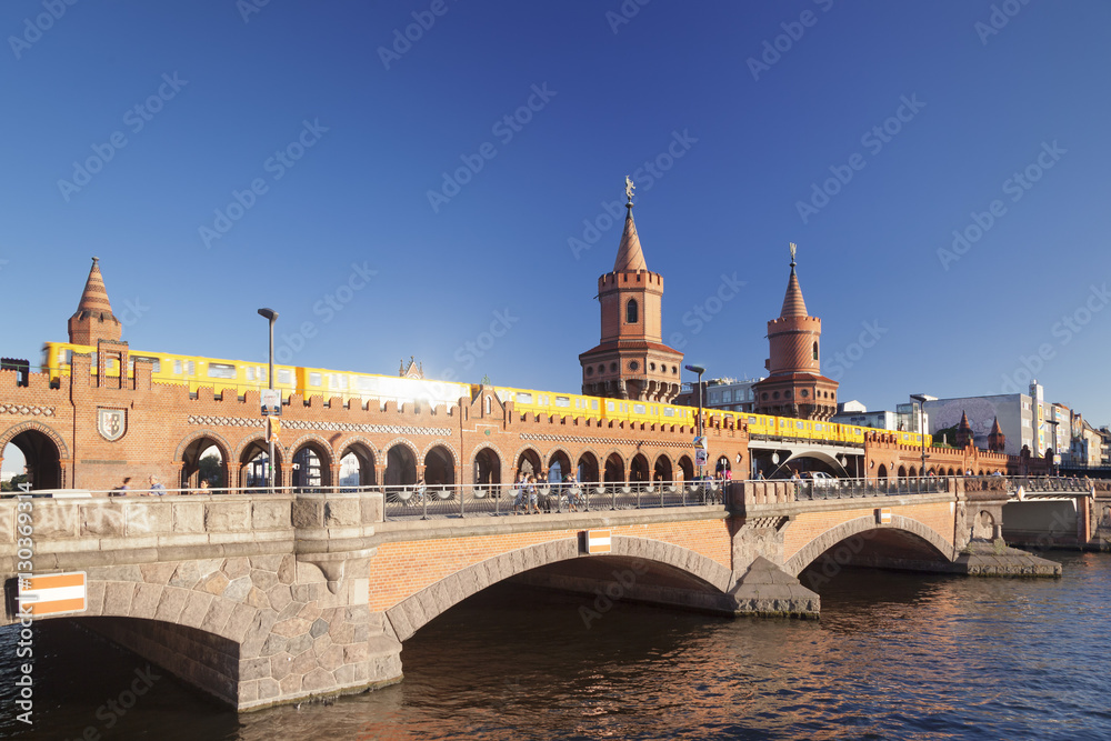 Oberbaum Bridge between Kreuzberg and Friedrichshain, Metro Line 1, Spree River, Berlin, Germany Oberbaum Bridge between Kreuzberg and Friedrichshain, Metro Line 1, Spree River, Berlin, Germany