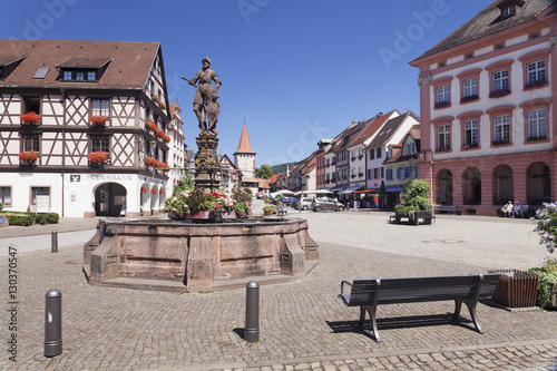 Roehrbrunnen Fountain at the market square, town hall and Obertorturm tower, Gengenbach, Kinzigtal Valley, Black Forest, Baden Wurttemberg, Germany photo