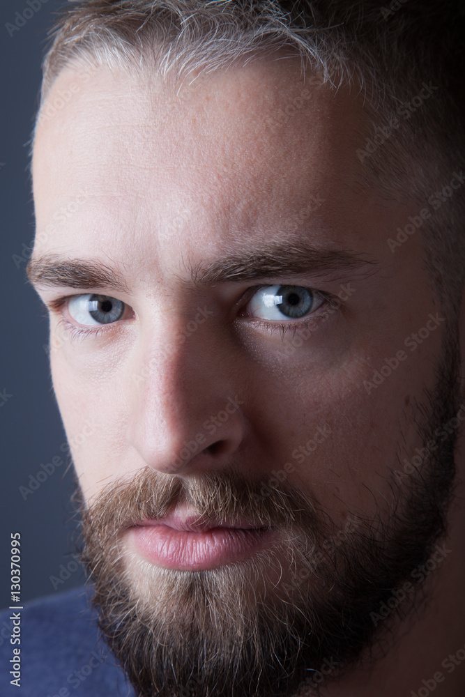 Portrait of a young man with a beard Portrait of a young man with a beard