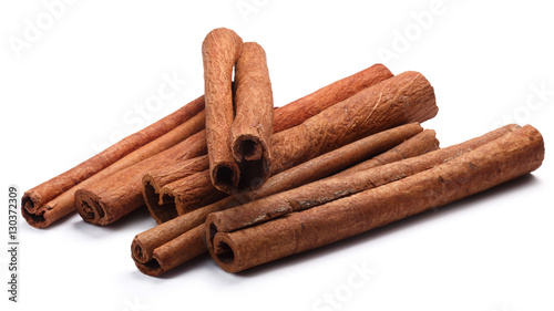 Fotografija Pile of cinnamon sticks, paths