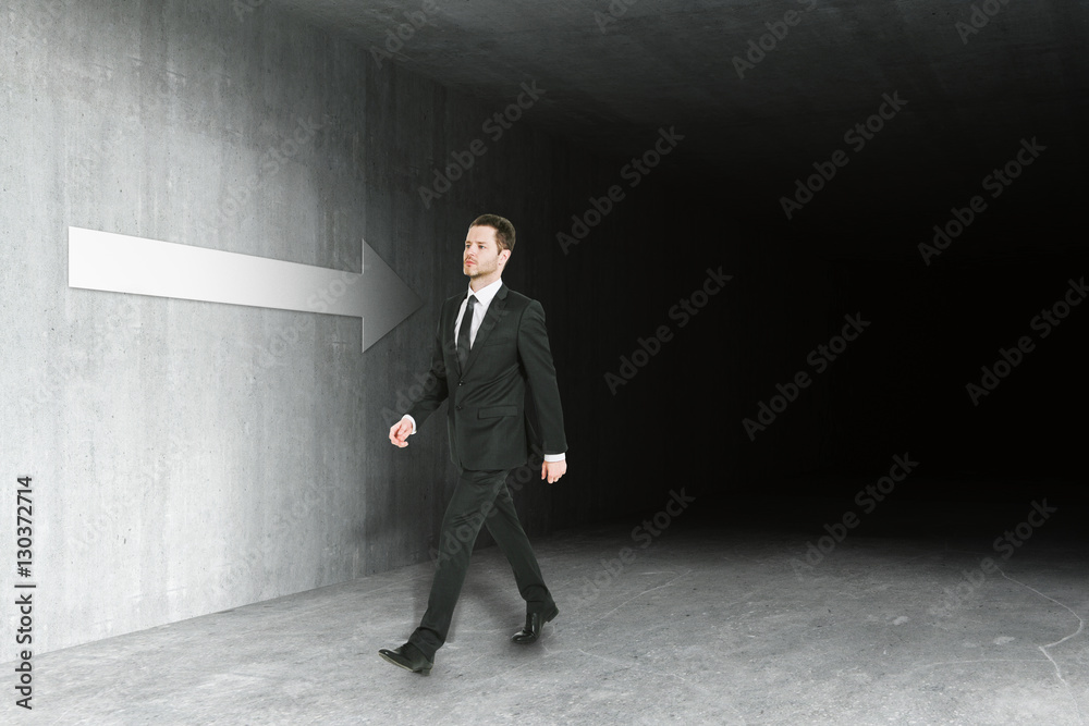 Fototapeta premium Man walking in grungy interior