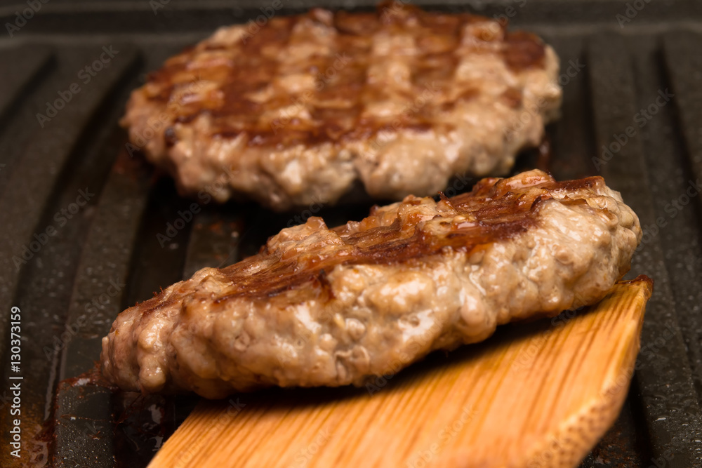 process of preparation of minced meat on the grill process of preparation of minced meat on the grill