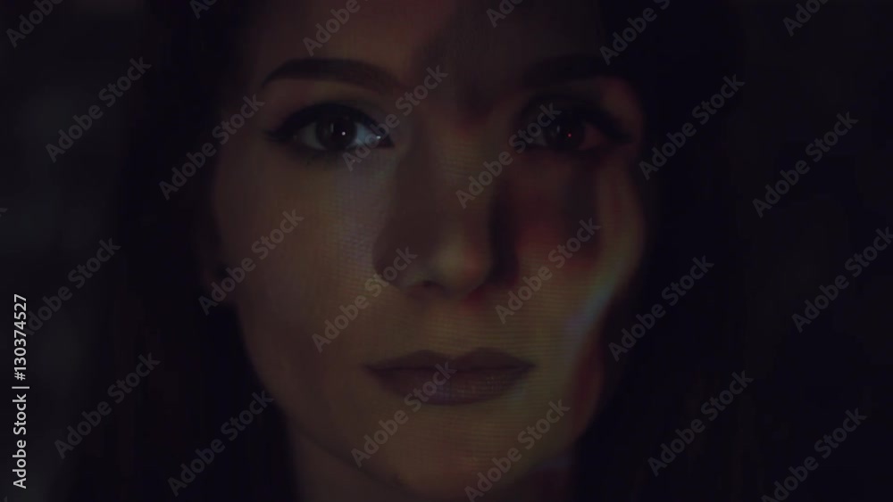4k Abstract Shot of a Woman Face with Projector Reflection of Fire 4k Abstract Shot of a Woman Face with Projector Reflection of Fire