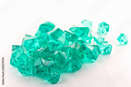 Turquoise crystals on a white background