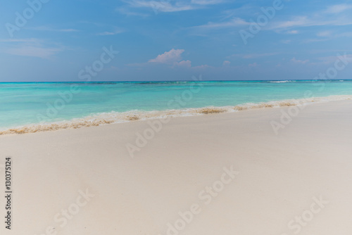 Clear sky with sea and sand
