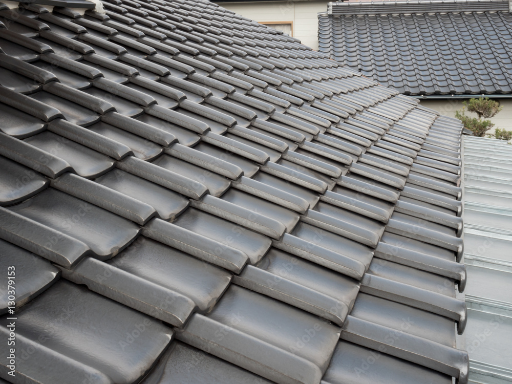 Dark gray tile roofing of traditional Japanese house Dark gray tile roofing of traditional Japanese house