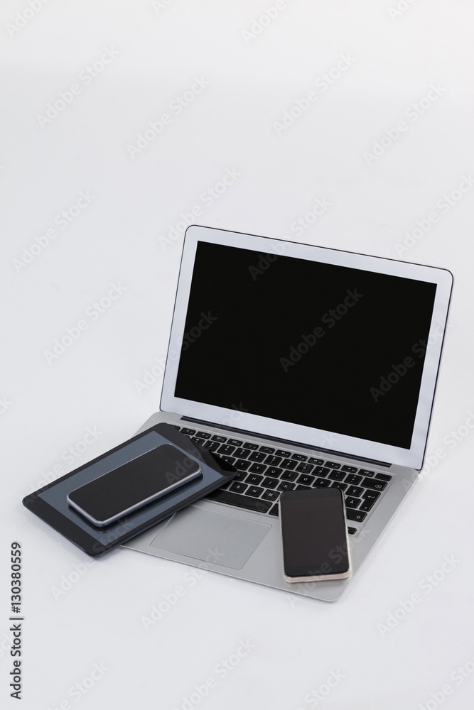 Laptop, digital tablet and mobile phones on white background Laptop, digital tablet and mobile phones on white background