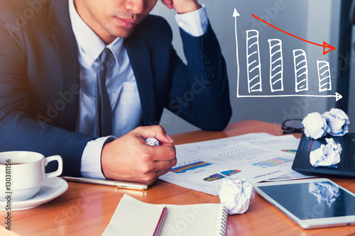 Businessman strain on earnings.