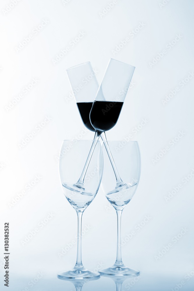 four glasses of wine on a light background four glasses of wine on a light background