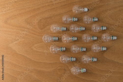 Electric bulbs on wooden plank