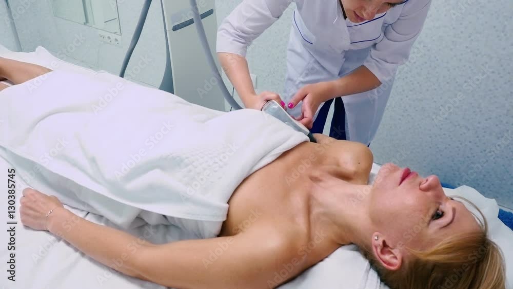 Vacuum massage on shoulder in the beauty clinic Vacuum massage on shoulder in the beauty clinic