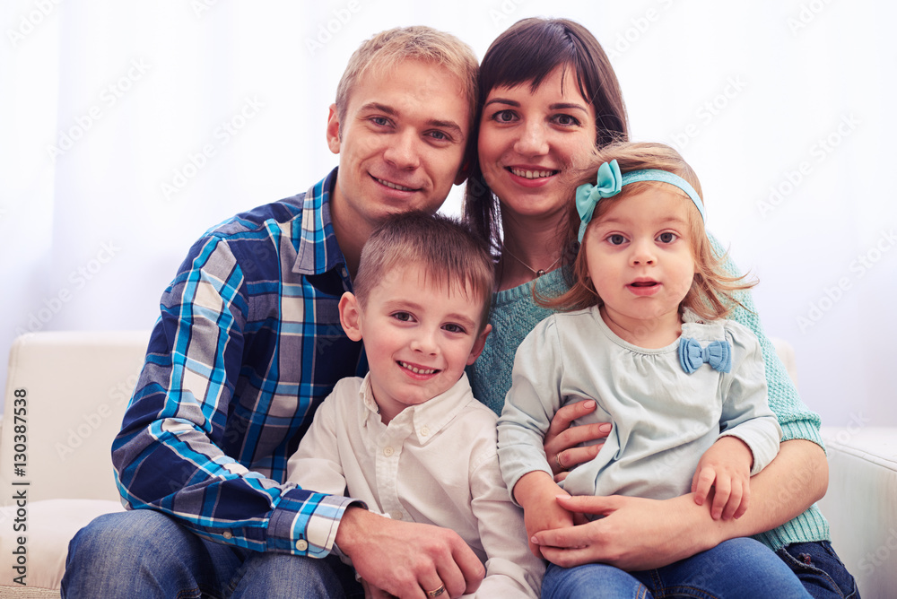 Young parents with children at home