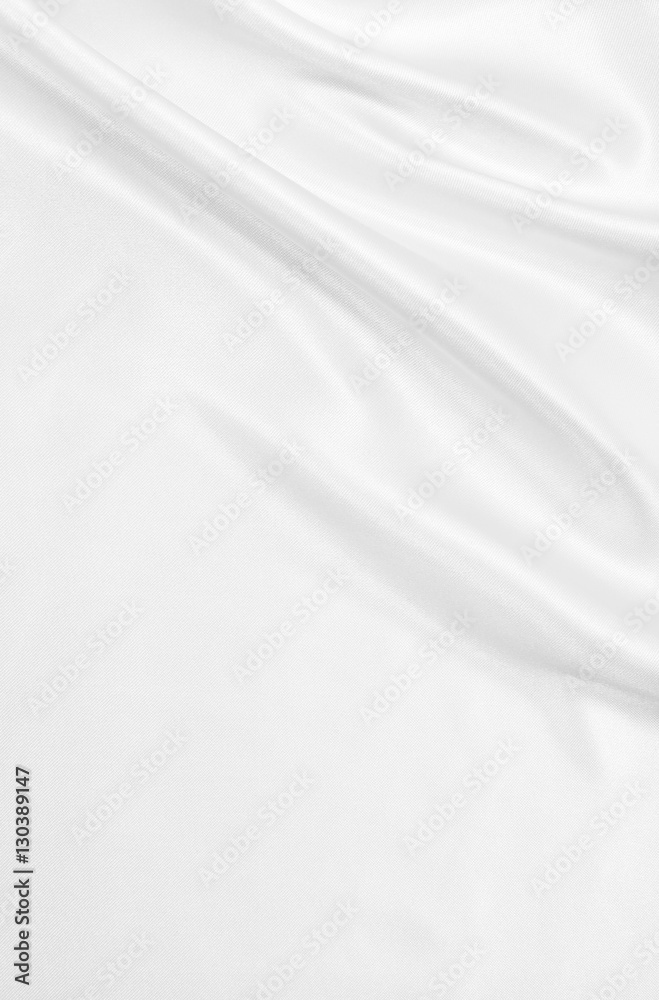 Smooth elegant white silk or satin luxury cloth texture as weddi