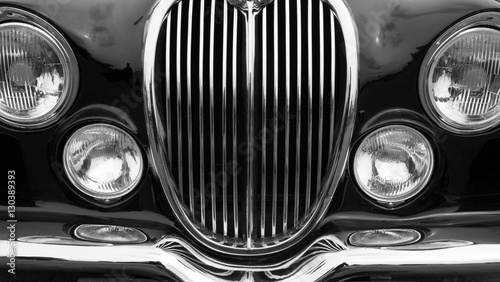 Vintage car detail with black color - chrome grille