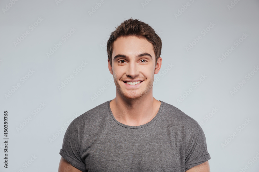 Portrait of a man in t-shirt looking at camera Portrait of a man in t-shirt looking at camera