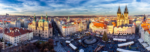 Panorama of Old Town square (czech: Staromestske namesti) during Christmas market with Castle, Church of our Lady Tyn, St. Nicholas church, Prague, Czech Republic. High resolution image.