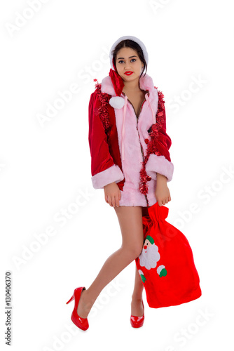 Beautiful young woman dressed christmas costume. Christmas and New Year image, isolated on white