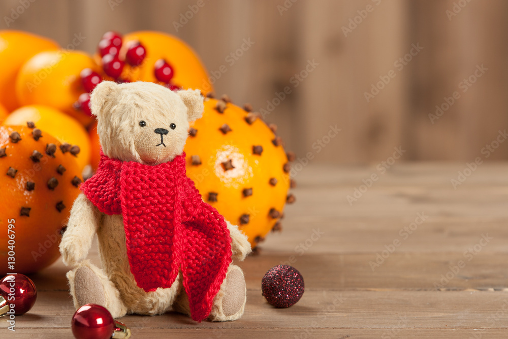Obraz premium Handmade Bear Toy With Red Scarf. Vintage Teddy Style. Pomander