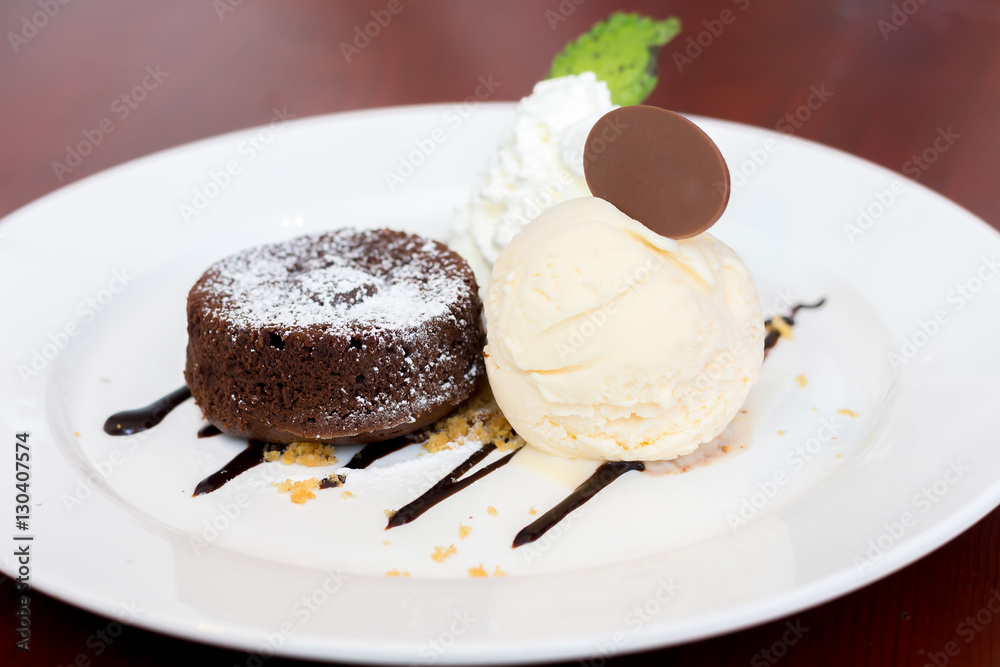 Chocolate Fondant Served with Vanilla ice cream and wipping crea Chocolate Fondant Served with Vanilla ice cream and wipping crea