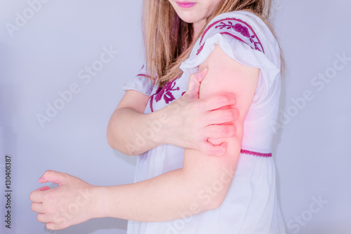 Wallpaper Mural injury woman touching her painful  Arm ache . Torontodigital.ca