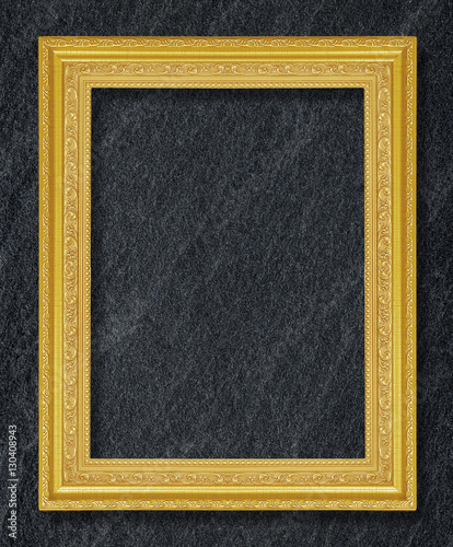 gold frame on black slate stone background