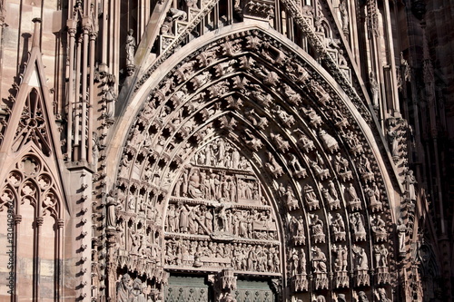 The Cathedral of Notre Dame, Our Lady, detail of tympanum and archivolts at Strasbourg, Alsace, France photo