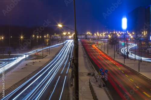 Night road in the city with car the light trails