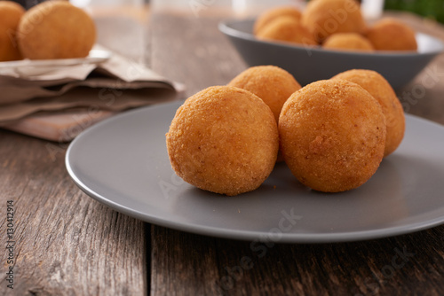 Arancini (deep fried rice balls with meat) Typical Sicilian street food