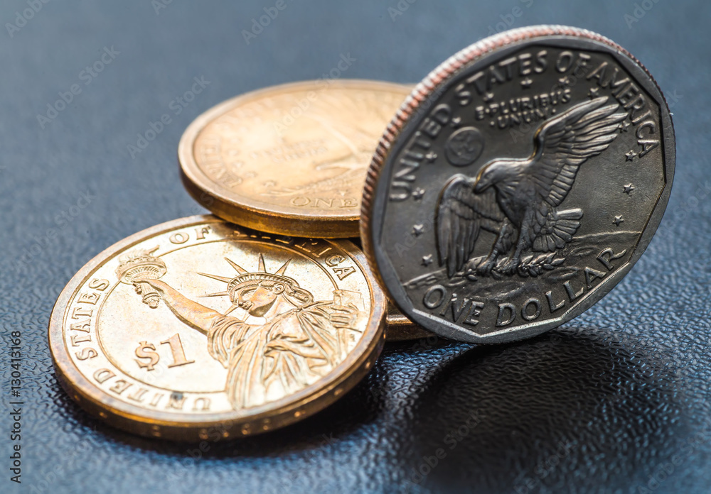 dollar coins stack on black dollar coins stack on black