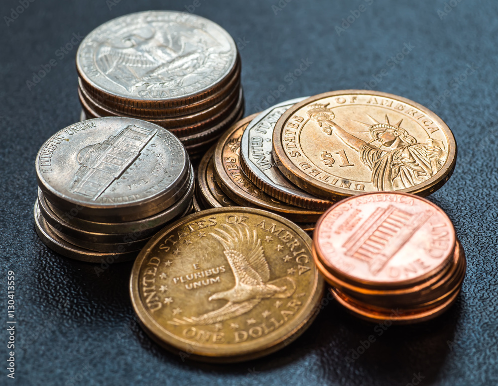 dollar coins stack on black dollar coins stack on black