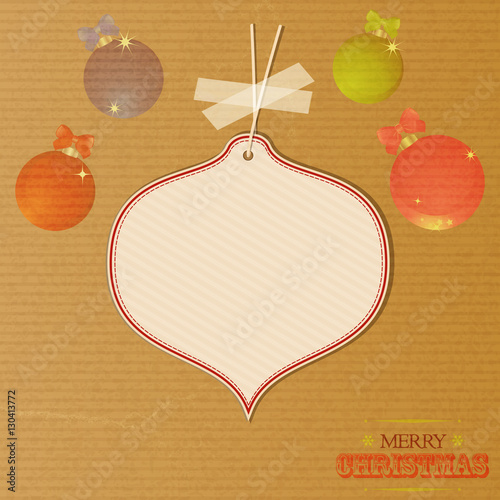Christmas message tag over decorated brownpaper