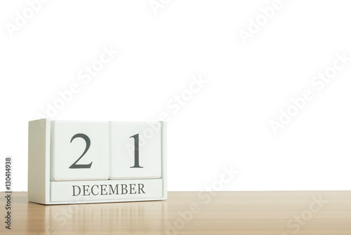 Closeup surface white wooden calendar with black 10 december wor
