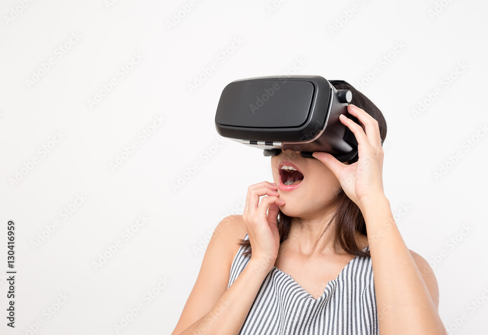 Woman feeling scary with using virtual reality headset Woman feeling scary with using virtual reality headset