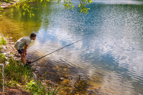 Teenager fishing at the lake