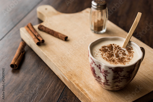 Turkish Salep with cinnamon sticks / Christmas Eggnog photo