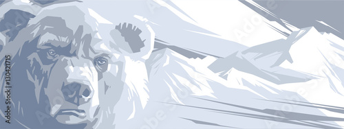 Angry bear in the snowy mountains