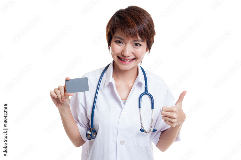 Asian young female doctor show thumbs up with blank card. Asian young female doctor show thumbs up with blank card.