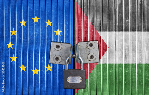 EU and Palestine flag on door with padlock photo