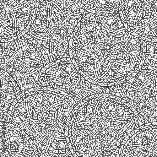 Hand drawn seamless mandala flowers pattern