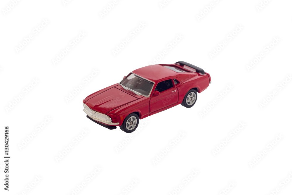 Red toy muscle car model isolated