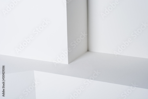 Abstract white geometric background of the wall