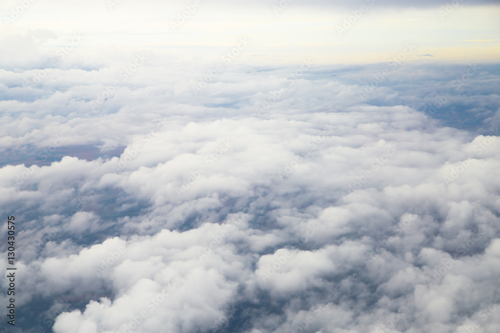 Closeup large gray clouds in the sky the view from the airplane window. Closeup large gray clouds in the sky the view from the airplane window.