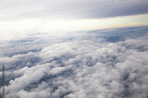 Fototapeta Naklejka Na Ścianę i Meble -  Closeup large gray clouds in the sky the view from the airplane window.