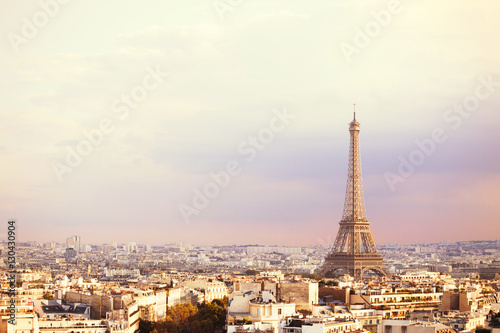 Sunset Eiffel tower and Paris city view form Triumph Arc. Eiffel Tower from Champ de Mars, Paris, France. Beautiful Romantic background. © Kotkoa