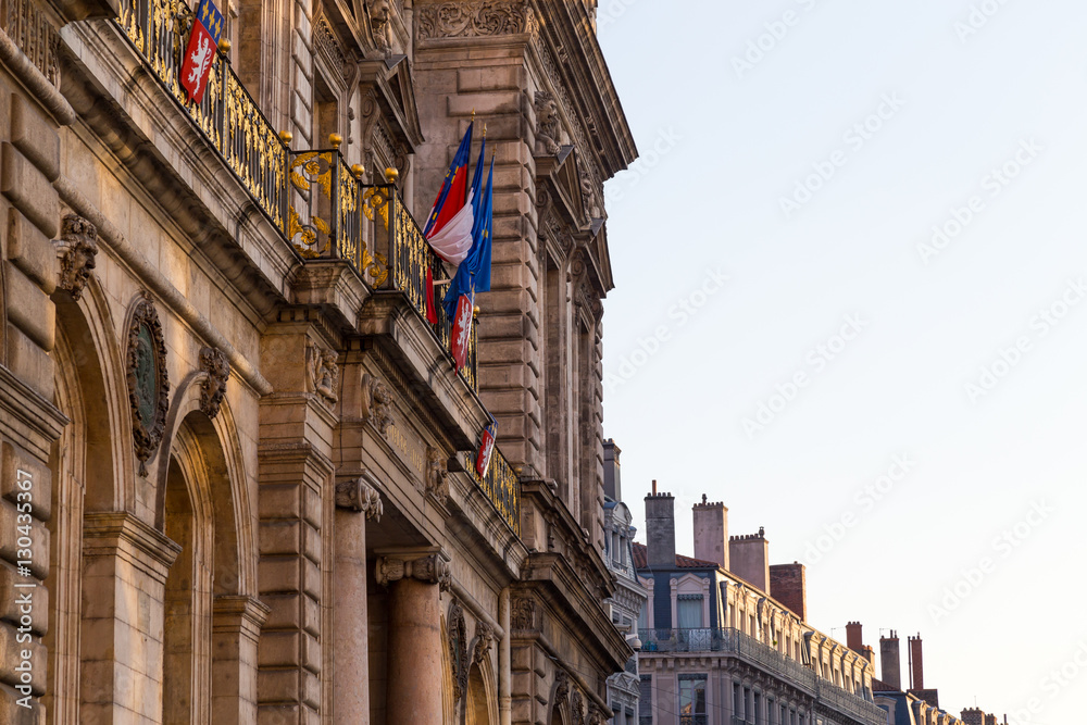 Townhall in lyon with french flag